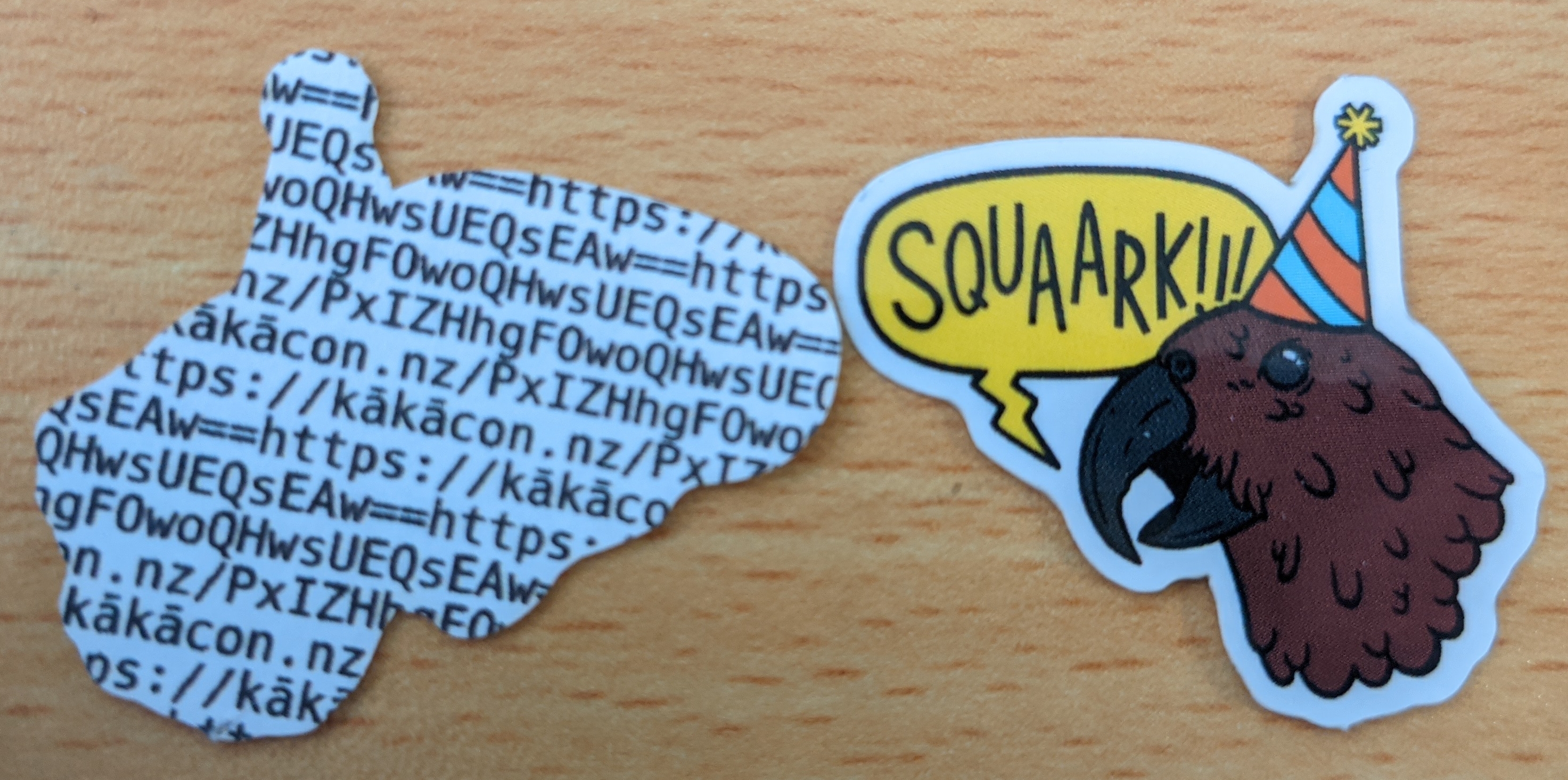 Front and back of the 2021 Kākācon sticker. The details of what is on the back is discussed just below.